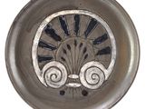 une image représentant une assiette décorative ornée d'un motif