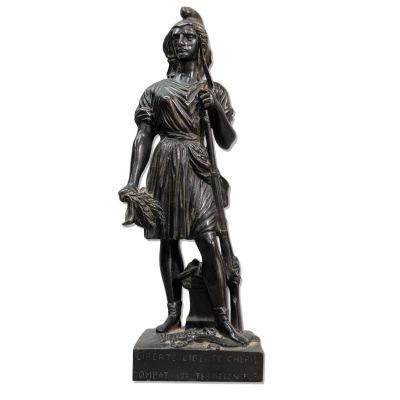 bronze statue of a woman holding a basket and a dog
