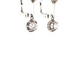 pair of silver earrings with crystal stones on a white background