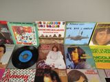 many different types of vinyl records on the table