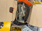 a box full of assorted hair brushes and other items