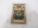a close up of a card with a picture of an eye on it