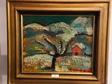 une peinture représentant un arbre au milieu d'un tableau posé sur un chevalet