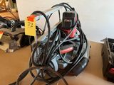 a lot of wires and tools on the table