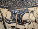 a close up of a vase with a design on it