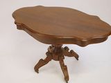 an image of a small table with a wooden top on a white background