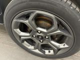 a close up of a tire on a car ' s rim