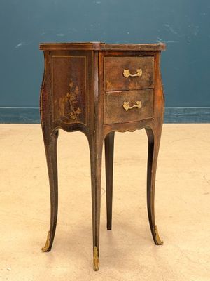an old wooden table with a drawer on top of it