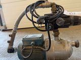 an image of a pump with a hose attached to it