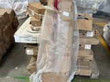 a pile of boxes that are on a pallet in a warehouse