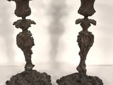 pair of antique cast iron candlesticks