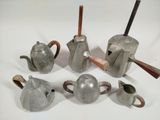 five different types of teapots and a tea pot