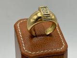 yellow gold men ' s ring with a diamond set in the center