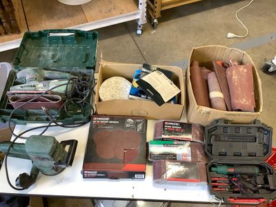 a table with a lot of tools on top of it