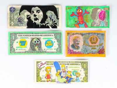 four different types of paper money are displayed on a white surface