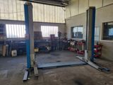 an image of a garage with a lot of tools in it