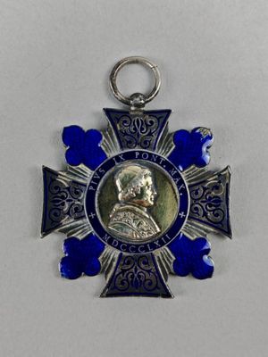 une image représentant une médaille sur laquelle figure le portrait d'un homme