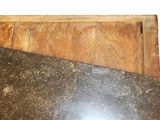 two pieces of wood on the floor next to each other