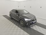 an image of a grey car in a garage