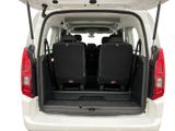 two seats in the back of a white van
