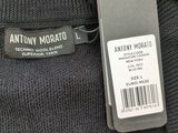 an image of a black sweater with a tag on it