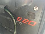a close up of a car door with the number twenty on it