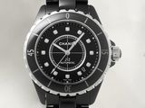 a black watch with white numbers on the face of it