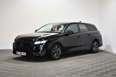 an image of a black car parked in a room