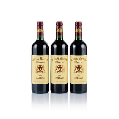 three bottles of red wine with a white background