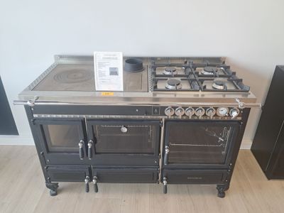 a black stove with two burners on top of it