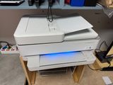a printer that is sitting on top of a table
