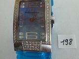 an image of a blue watch with diamonds on the face