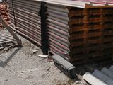 a pile of metal and wood sitting on the ground