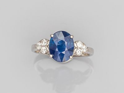 a sapphire and diamond three stone ring