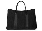 a black tote bag sitting on top of a white surface