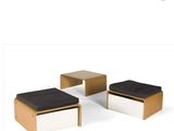 three stools and a table on a white background