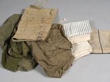 a pile of clothing that is sitting on a table