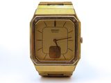 an image of a close up of a wrist watch on a white surface