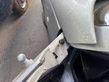 a close up of a car that has been damaged