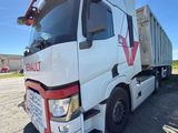 a truck that is parked on the side of the road