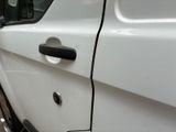 a close up of a car door handle on the side of the car