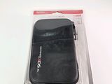 a black case sitting on top of a white table