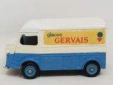 a toy truck with a sign on the side of it
