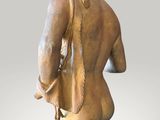 an image of a statue of a man with a bag on his back
