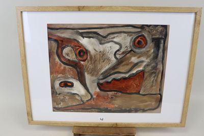 tableau encadré représentant une peinture d'un chien et d'un chat posée sur un chevalet en bois