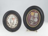 pair of framed pictures of a vase and a vase on a stand