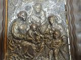 an image of a metal relief of a nativity scene
