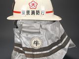 a white hard hat with a red star on it