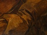a painting of a pair of brown shoes on a table