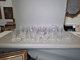 a lot of empty wine glasses sitting on a table